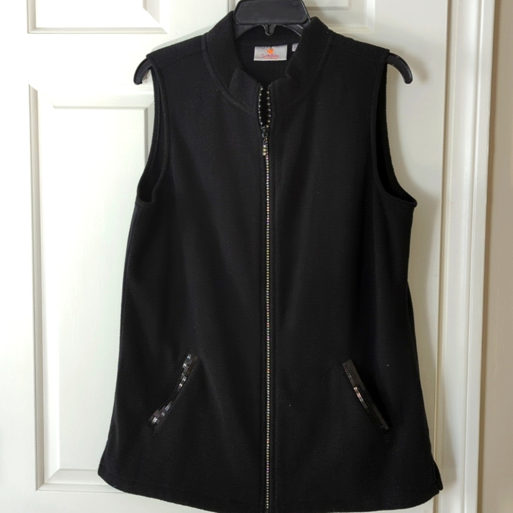 Long black fleece like vest with bling